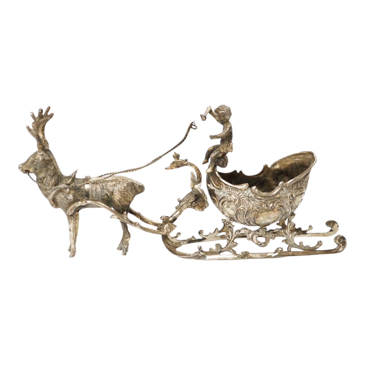 A modern continental silver sleigh with putto and reindeer, import marks for London, 1974, 16cm. Condition - poor